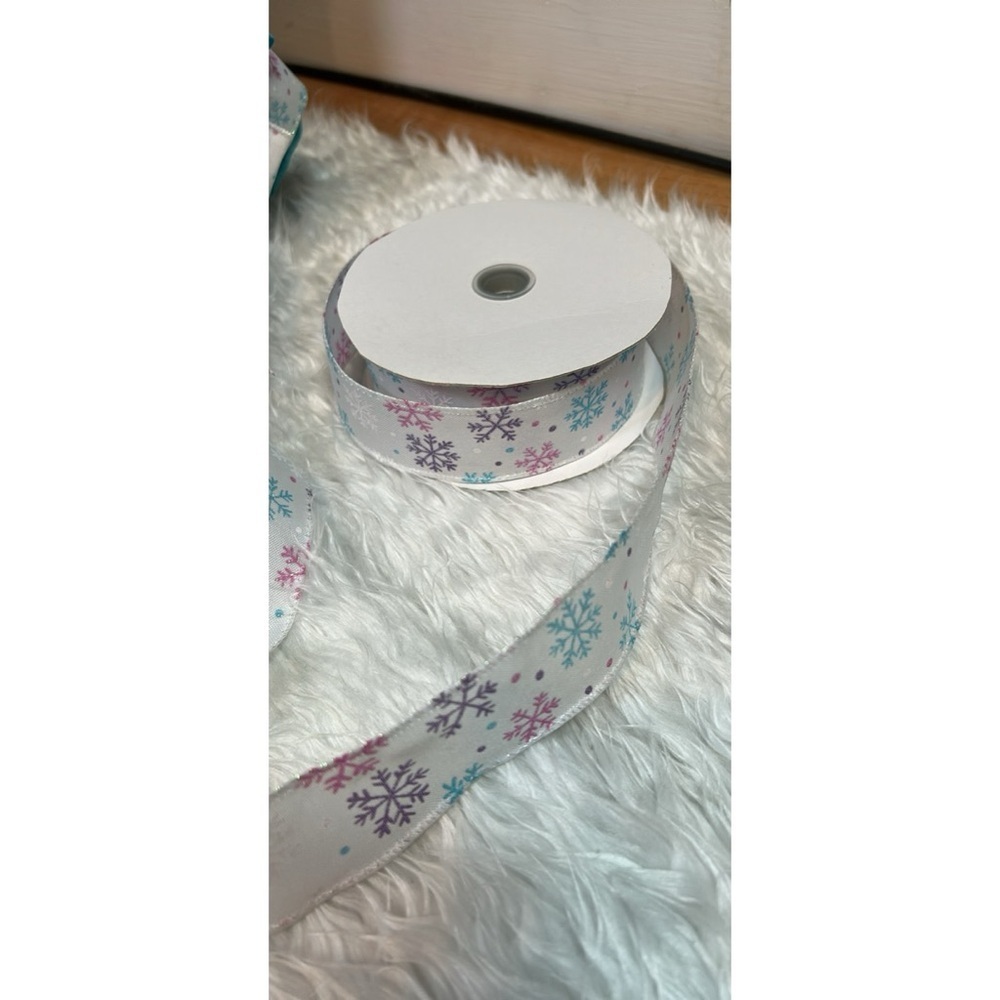 Two frozen themed Christmas tree, toppers, multiple bows, and extra ribbon - Picture 4 of 4